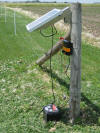 B280 Solar Energizer - wood post mount with battery on ground